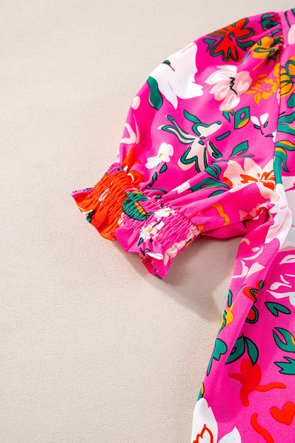 Blouse met rozenbloemen en split-V-hals en pofmouwen