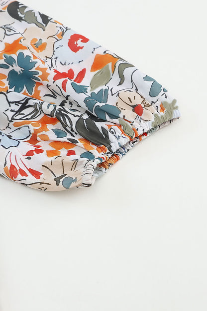 Veelkleurige blouse met split en V-hals, pofmouwen en bloemenprint
