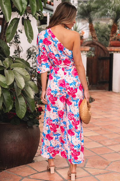Roze bloemenprint asymmetrische halslijn enkele schouder drape mouw riem jumpsuit