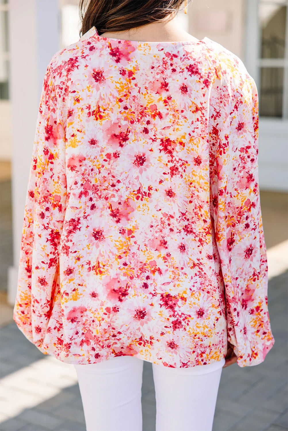 Roze, met bloemen bedrukte blouse met V-hals en bubbelmouwen