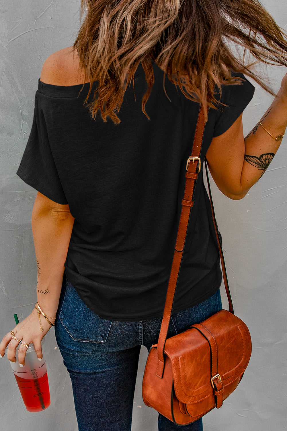 Zwart T-shirt met zakken en zijsplitten