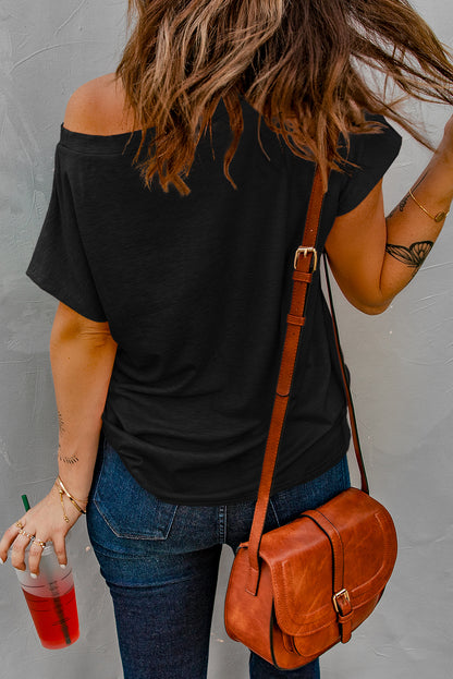 Zwart T-shirt met zakken en zijsplitten