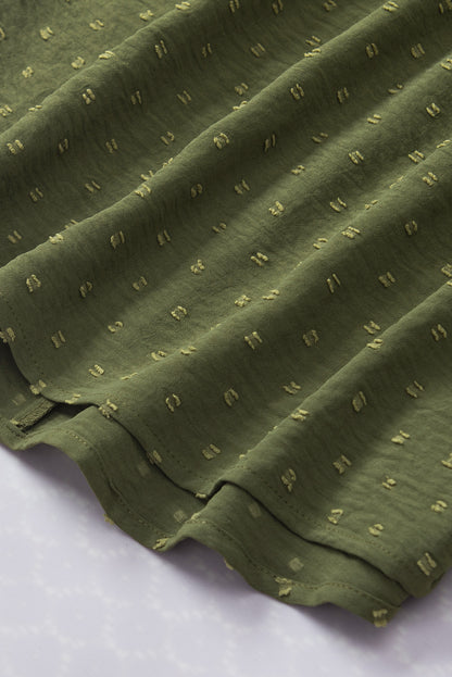 Mistgroene blouse met Zwitserse stippen en vleermuismouwen