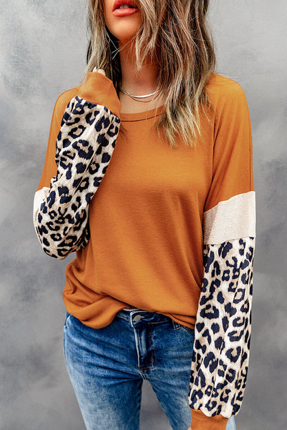 Bruine top met lange mouwen en patchwork met luipaardpailletten