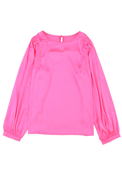 Roze satijnen blouse met ronde hals en lange mouwen