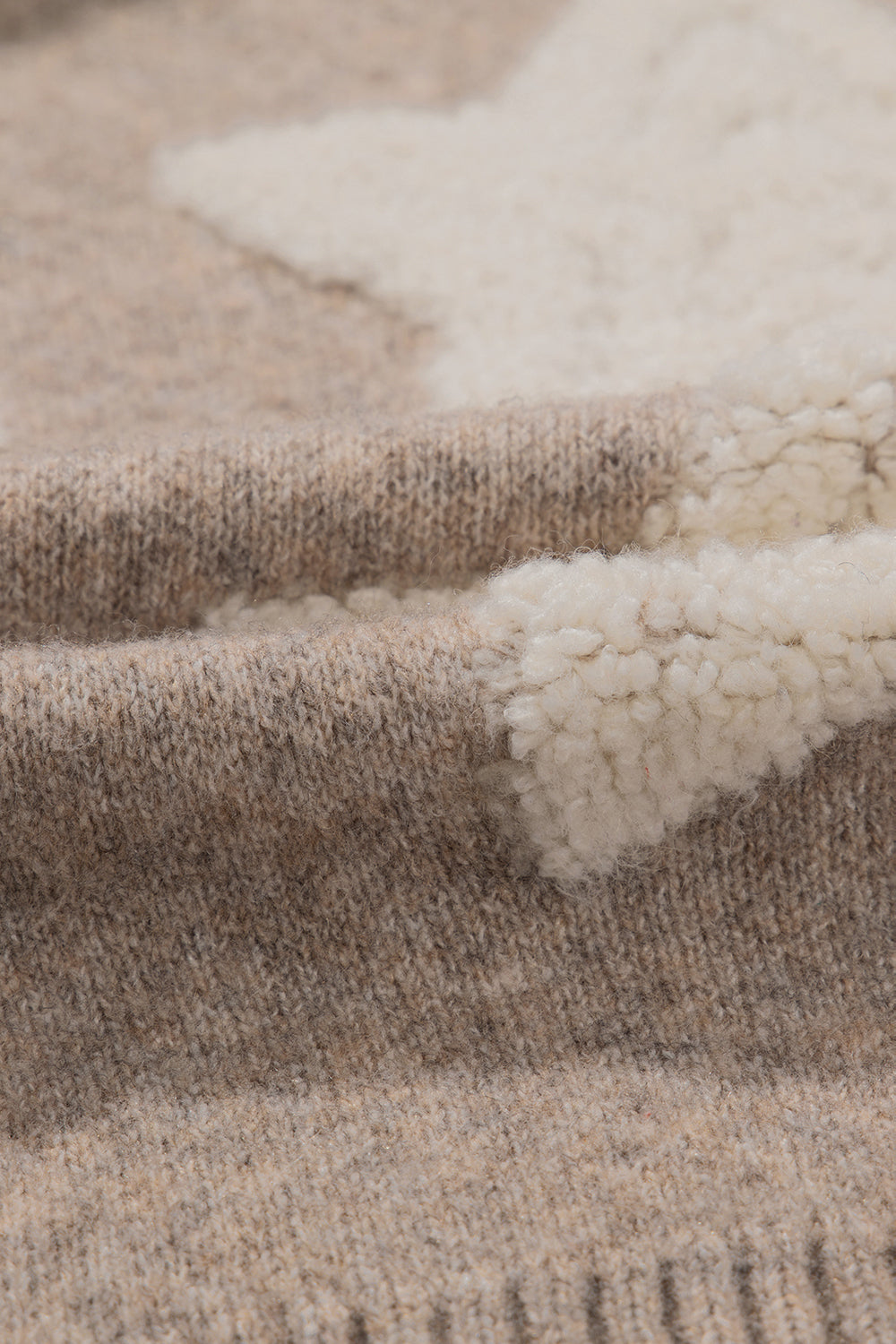 Kaki vest met sherpa-sweater met sterrenpatroon en zakken