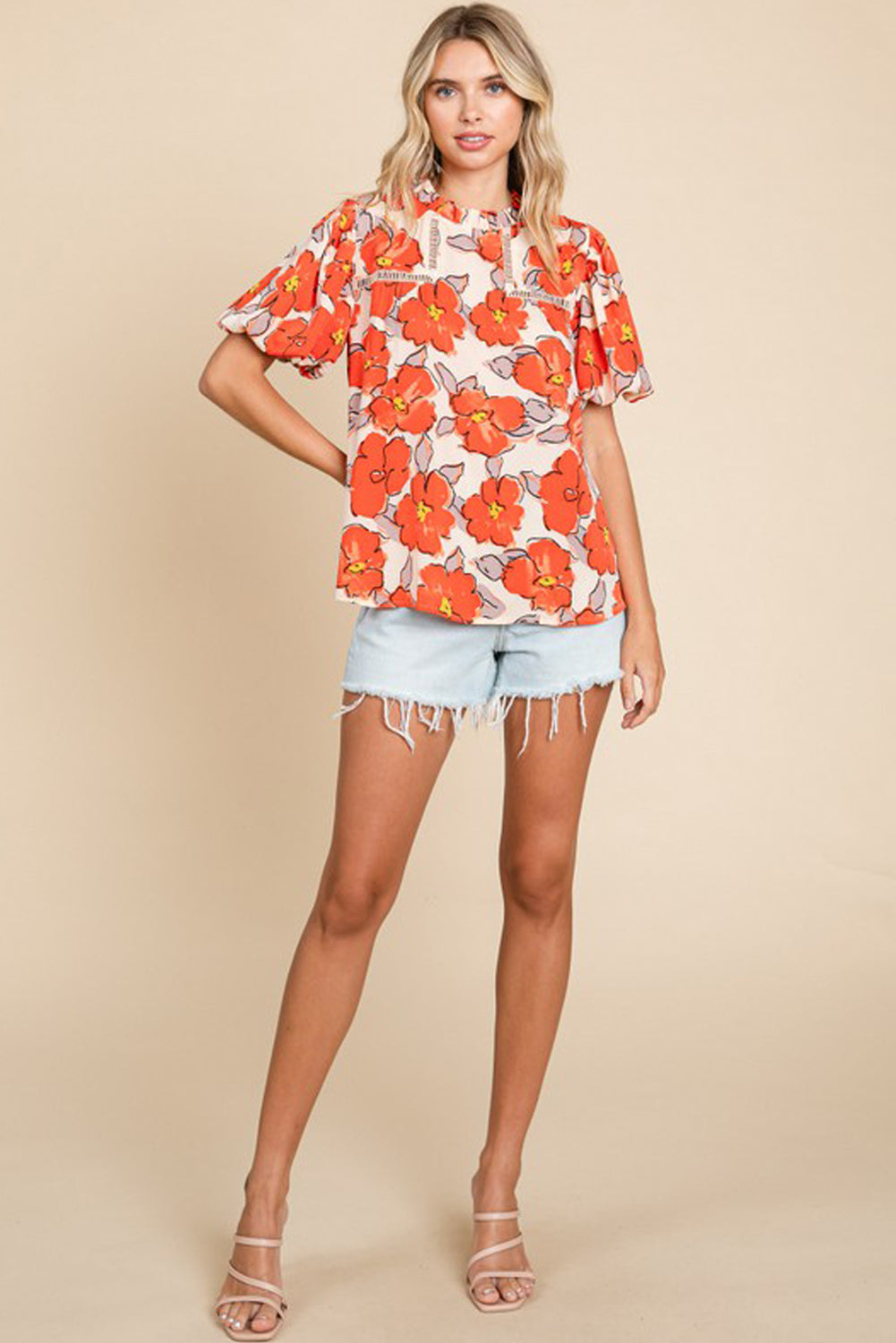Oranje bloemen losse blouse met bubbelmouwen en ruches aan de hals