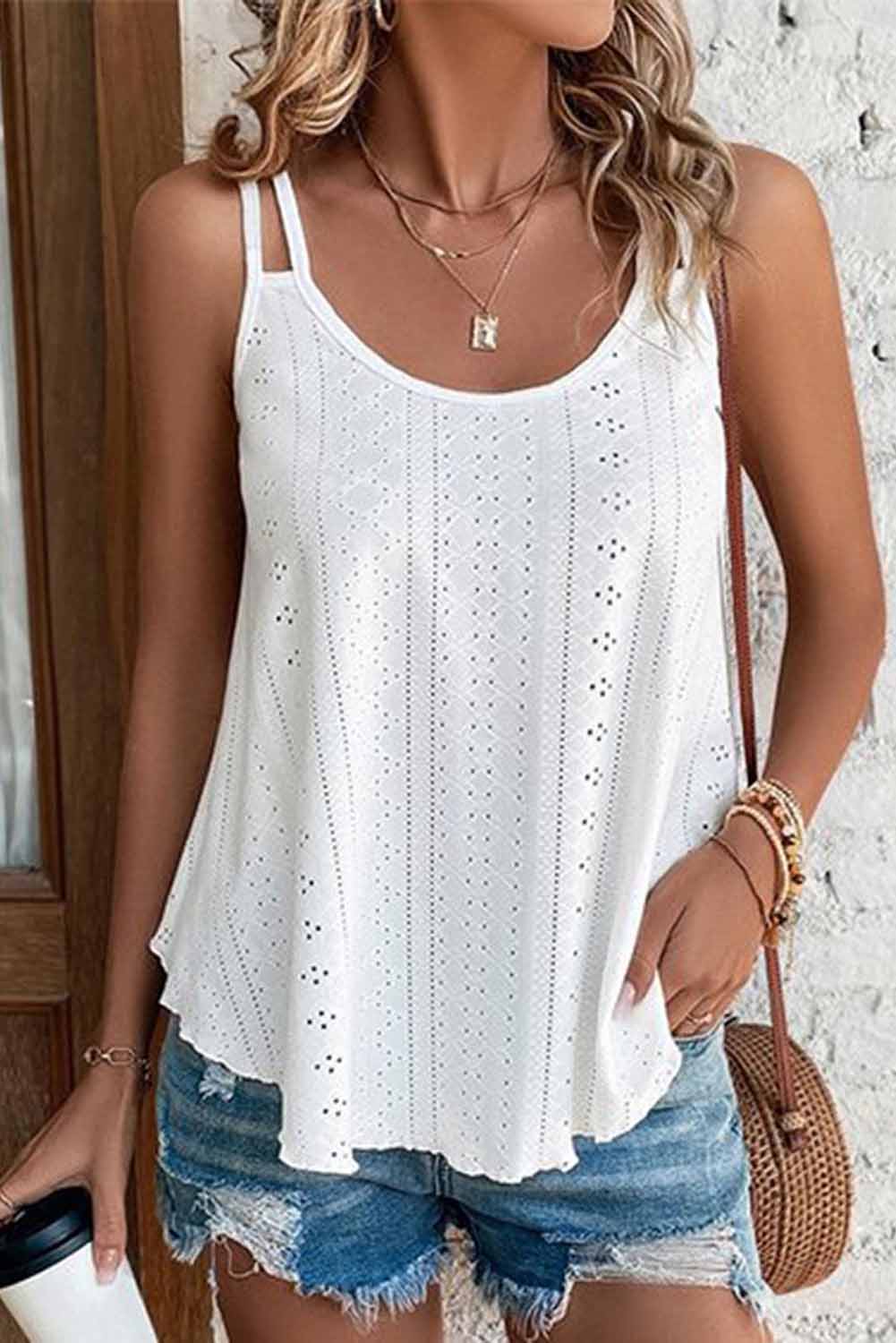 Witte tanktop met ronde hals en oogjes met bandjes