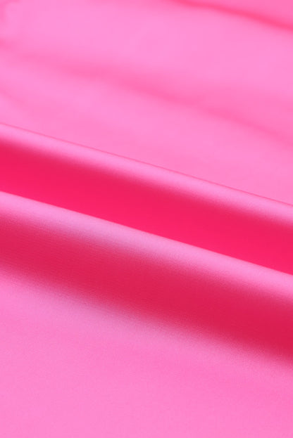 Roze satijnen blouse met ronde hals en lange mouwen