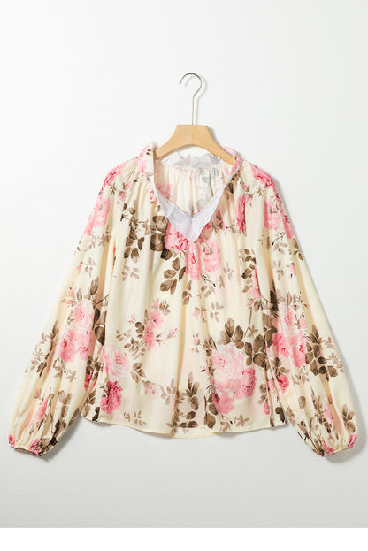 Beige blouse met V-hals met bloemenprint en lantaarnmouwen