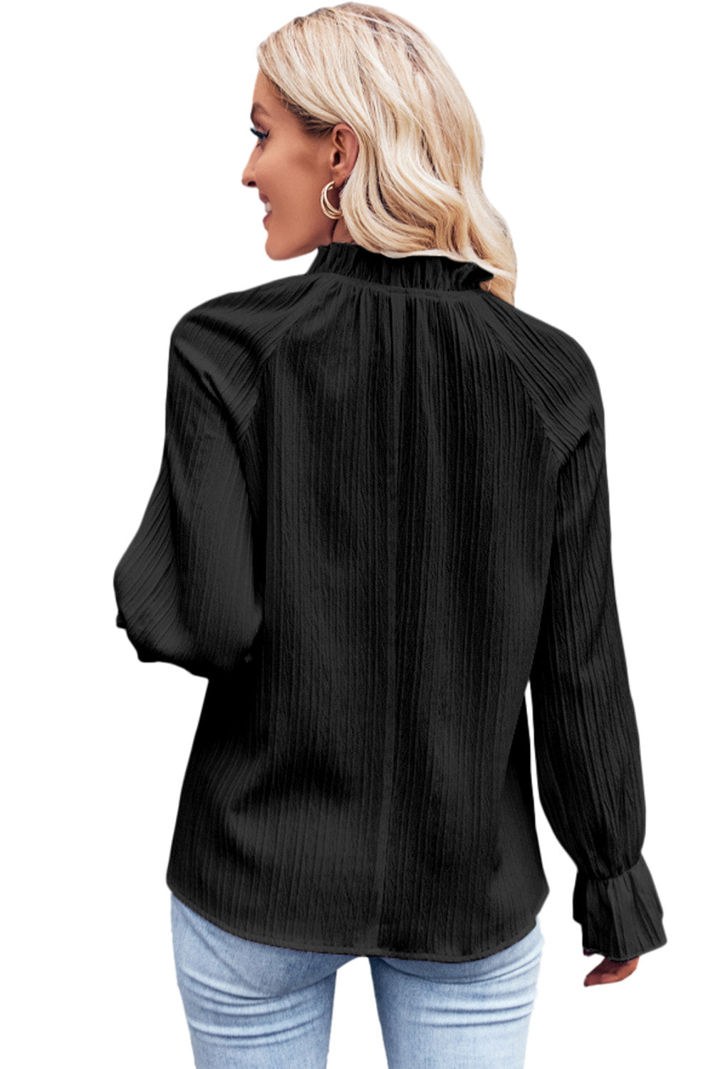 Zwarte blouse met ruches en rimpelige bubbelmouw