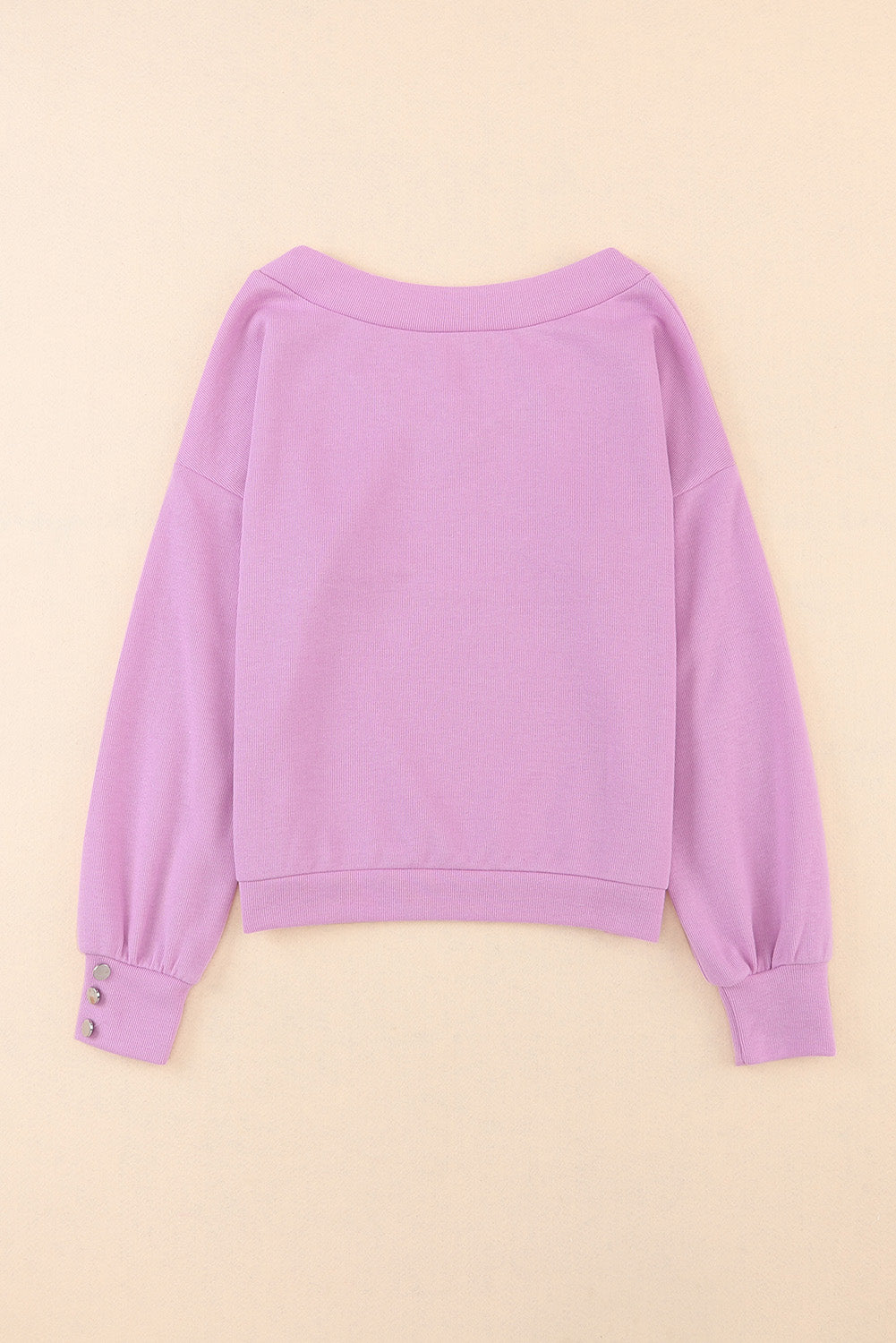 Paarse gebreide blouse met V-hals en knoopmanchetten
