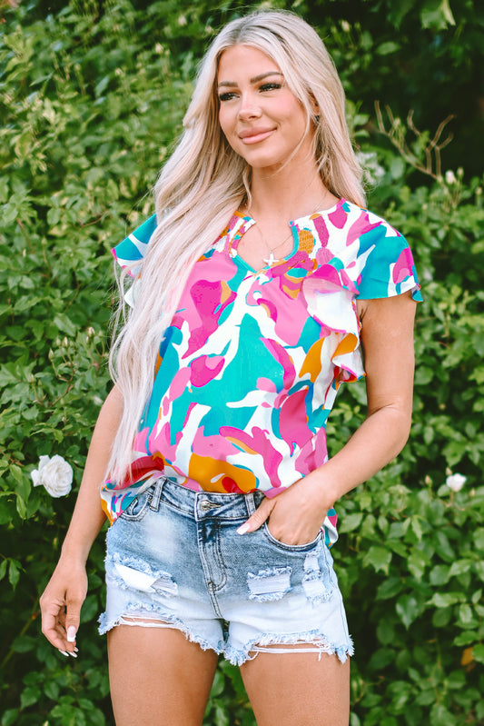 Veelkleurige blouse met abstracte print en gekerfde hals en fladdermouwen