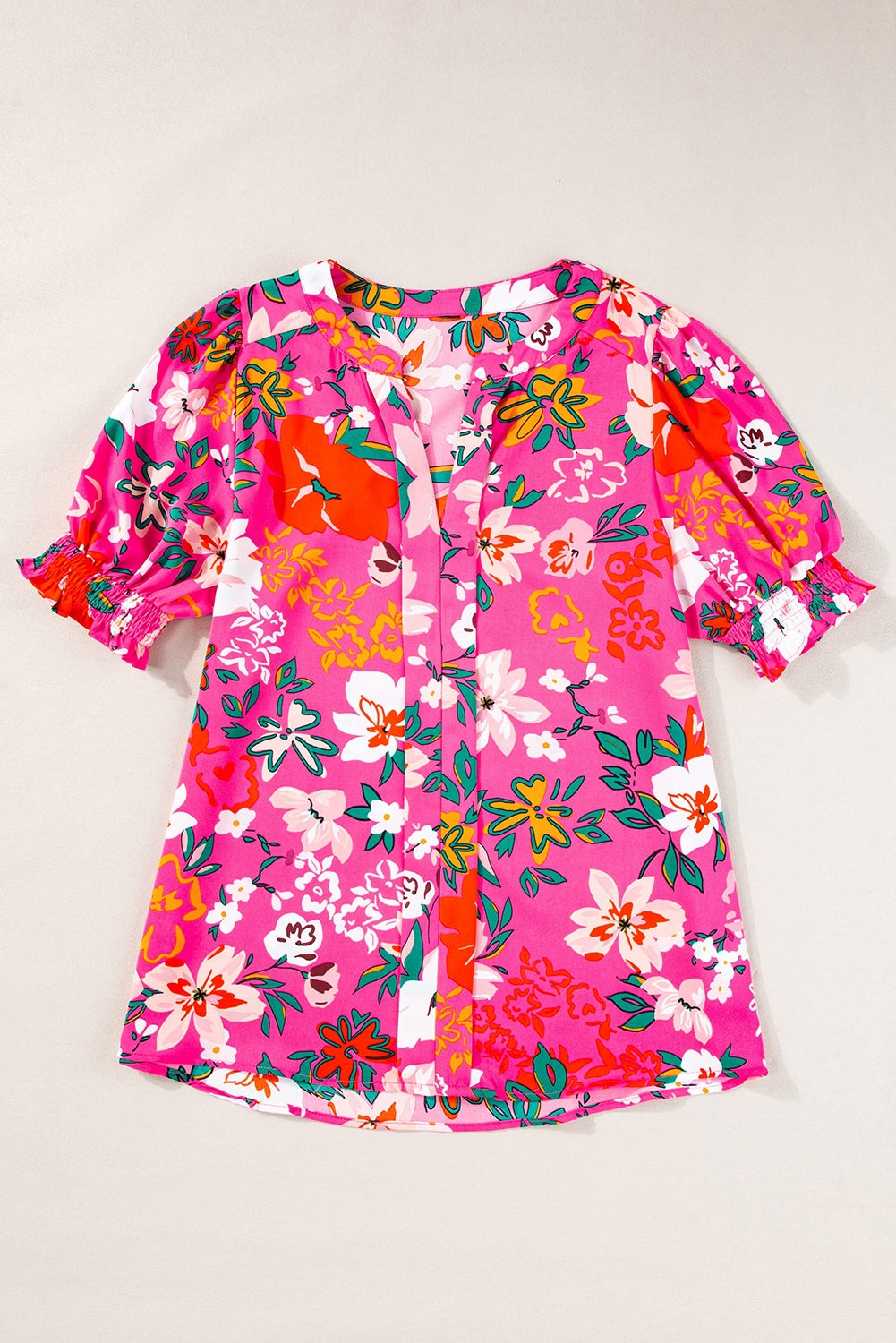 Blouse met rozenbloemen en split-V-hals en pofmouwen