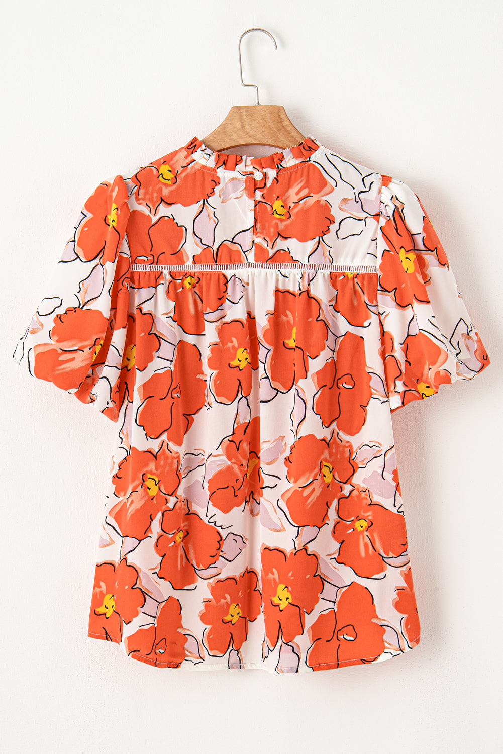 Oranje bloemen losse blouse met bubbelmouwen en ruches aan de hals