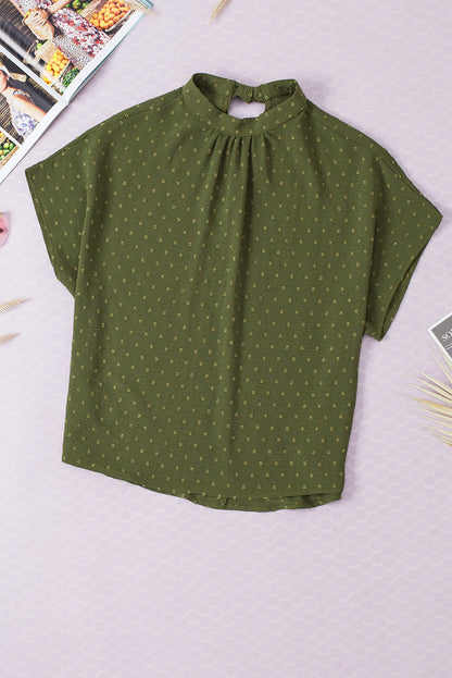 Mistgroene blouse met Zwitserse stippen en vleermuismouwen
