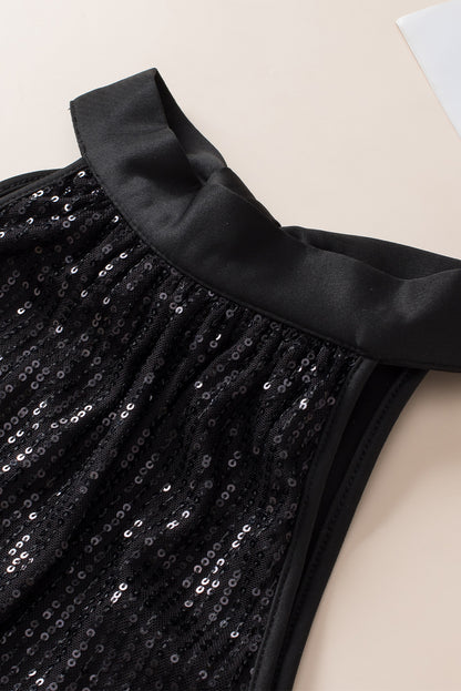 Zwarte tanktop met sleutelgat en lovertjes op de rug