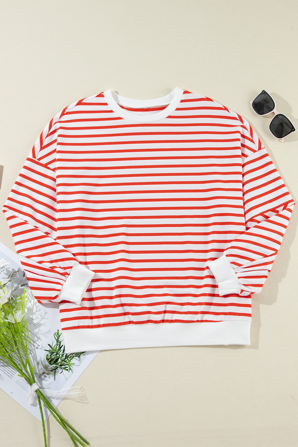 Oranje gestreept los sweatshirt met lage schouder en ronde hals