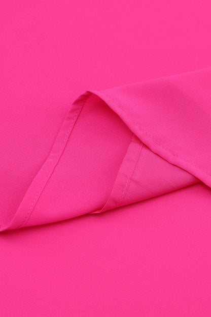 Roze geplooide blouse met V-hals en gezwollen mouwen