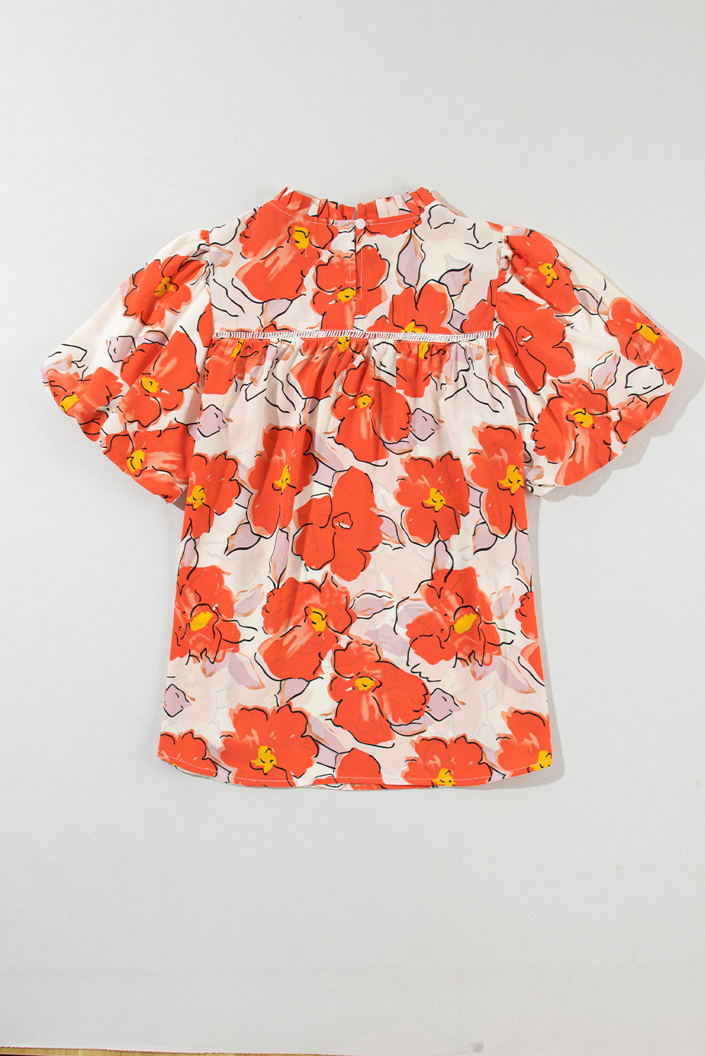 Oranje bloemen losse blouse met bubbelmouwen en ruches aan de hals