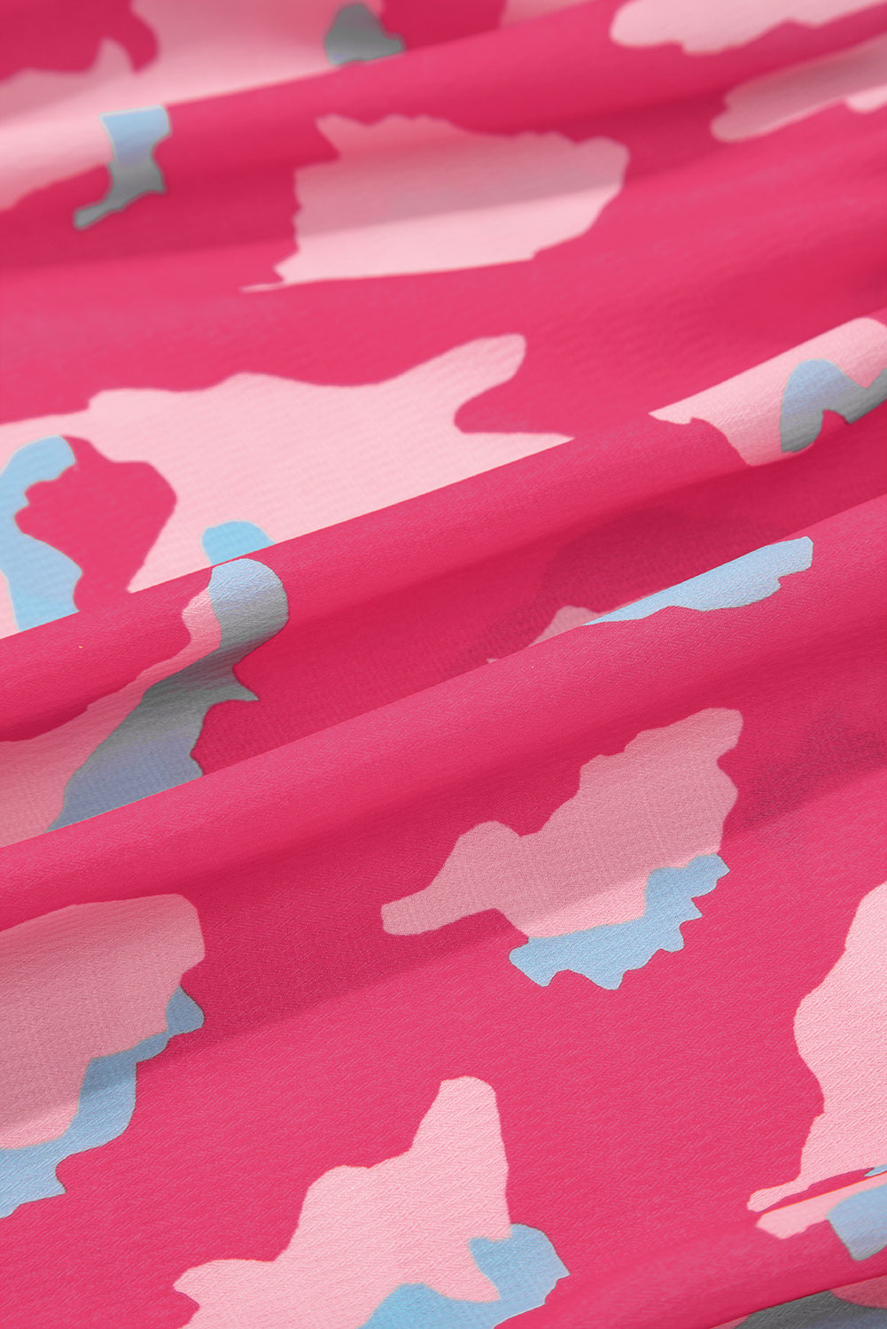 Gesmokte blouse met V-hals en pofmouwen met rozen-abstracte print