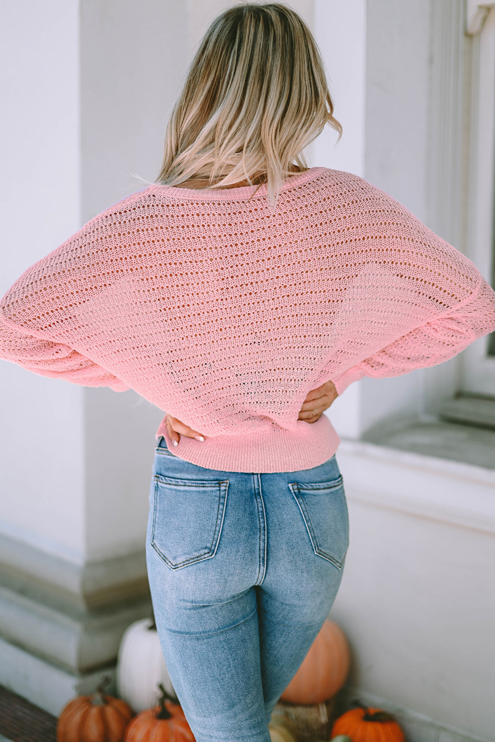 Roze gebreide top met ronde hals en lange mouwen