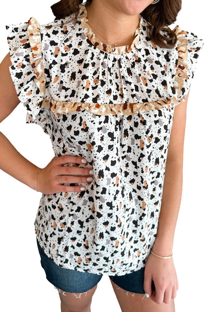 Witte blouse met luipaardprint en dierenvlekken
