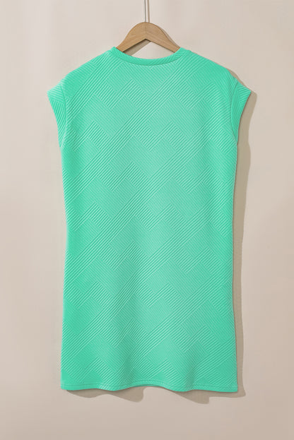 Mintgroene T-shirtjurk met getextureerde kapmouw