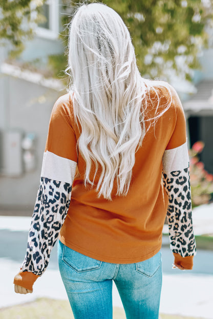 Bruine top met lange mouwen en patchwork met luipaardpailletten