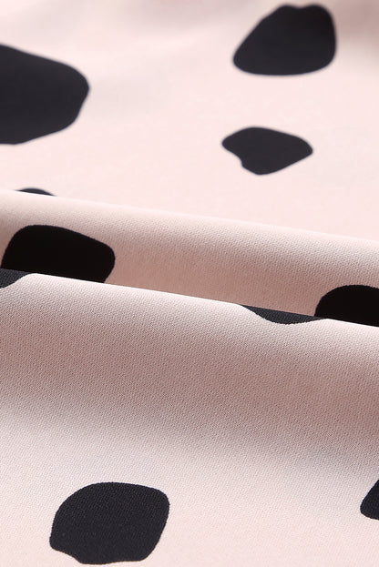 Oversized blouse met roze knopen en ruches aan de manchetten