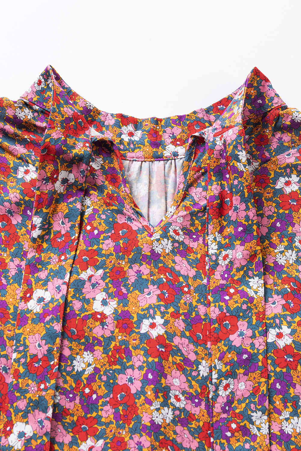 Paarse bloemenprint geknoopte blouse met hoge hals en pofmouwen