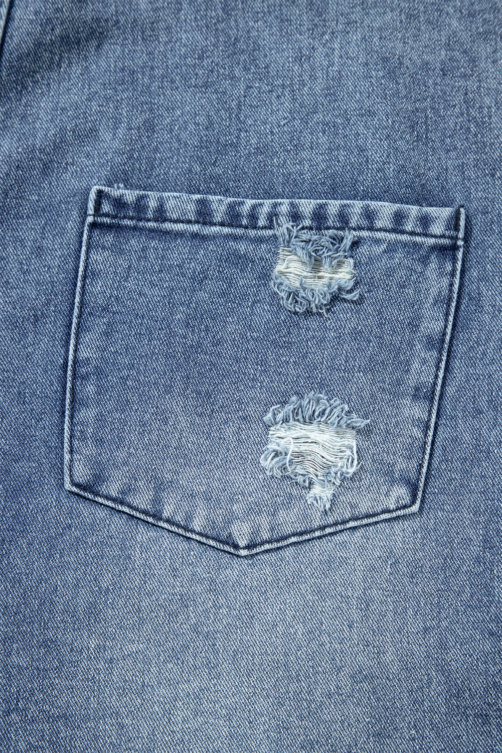 Steenblauwe bedroefde slabbetje zak wijd been denim in het algemeen