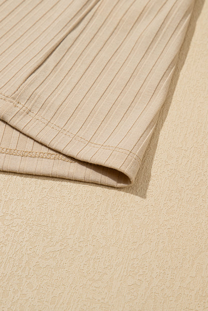 Beige geribbelde kraag met knopen met lange mouwen slanke bovenste top