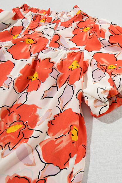 Oranje bloemen losse blouse met bubbelmouwen en ruches aan de hals